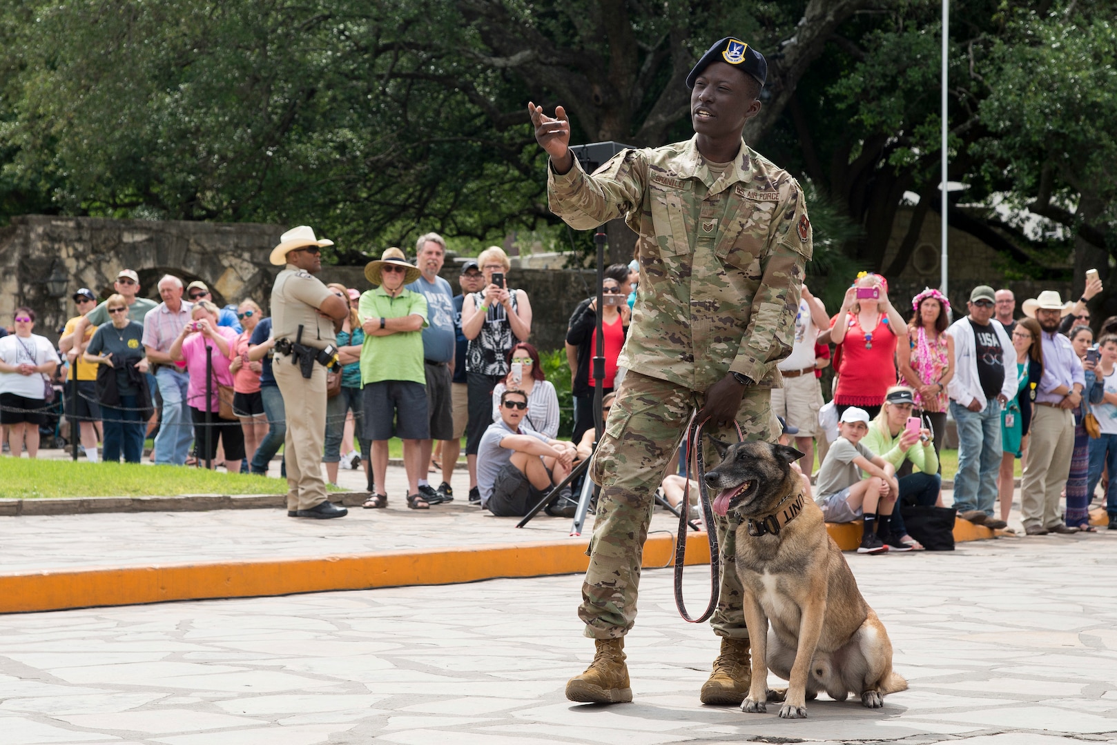 Staff Sgt. Wilson Brantley, 802nd Security Forces Squadron military working dog handler, performs a K-9 demonstration during San Antonio’s Fiesta Air Force Day at the Alamo, April 22, 2019. From its beginning in 1891, Fiesta has grown into an annual celebration that includes civic and military observances, street and river parades, exhibits, pilgrimages and memorials.