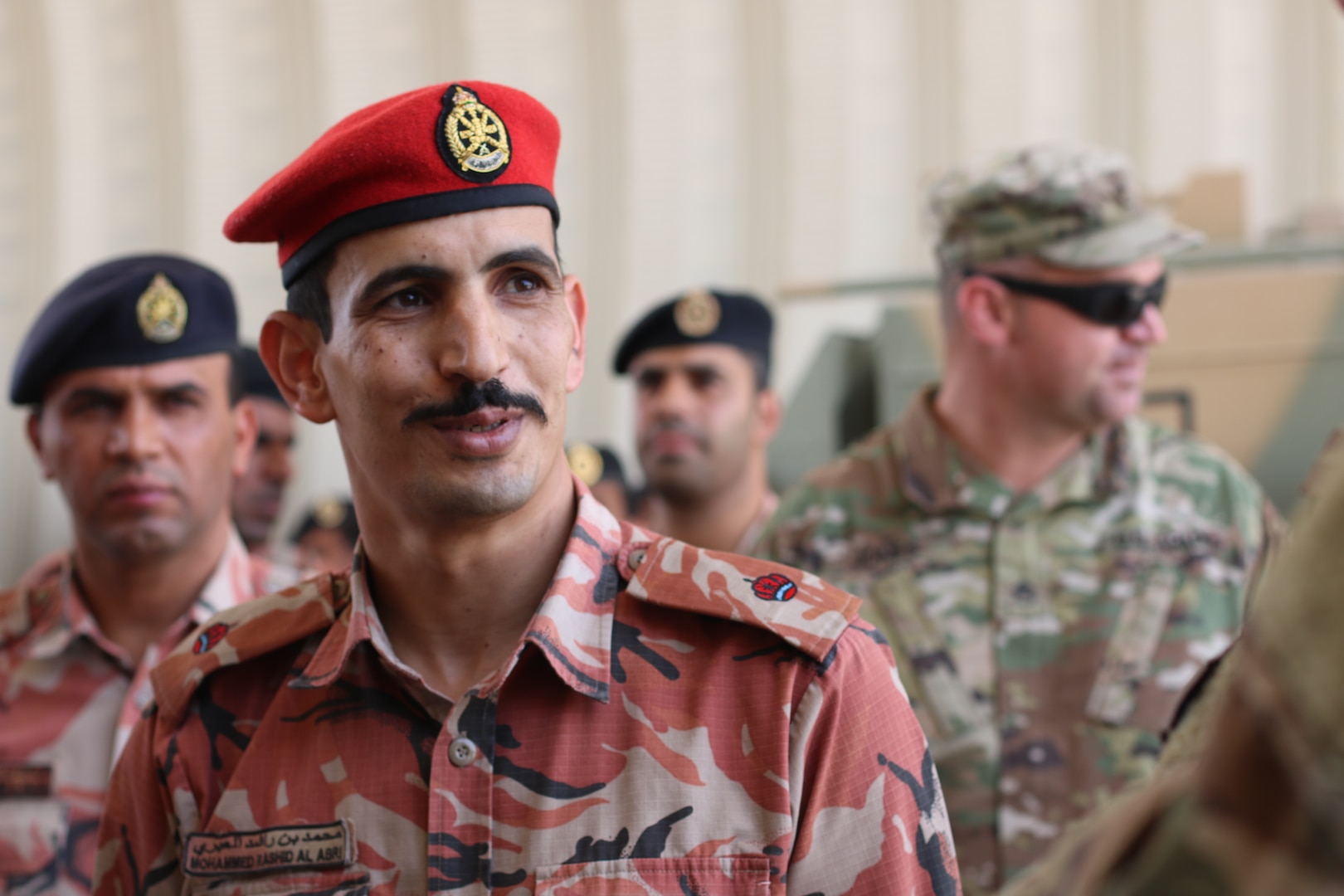 Maj. Mohammed Rashid Al Abri, Royal Army of Oman, smiles during the Heavy Equipment Transporter System Subject Matter Exchange II held at Sultan bin Safy Camp Shafa Oman, April 6-11, 2019.