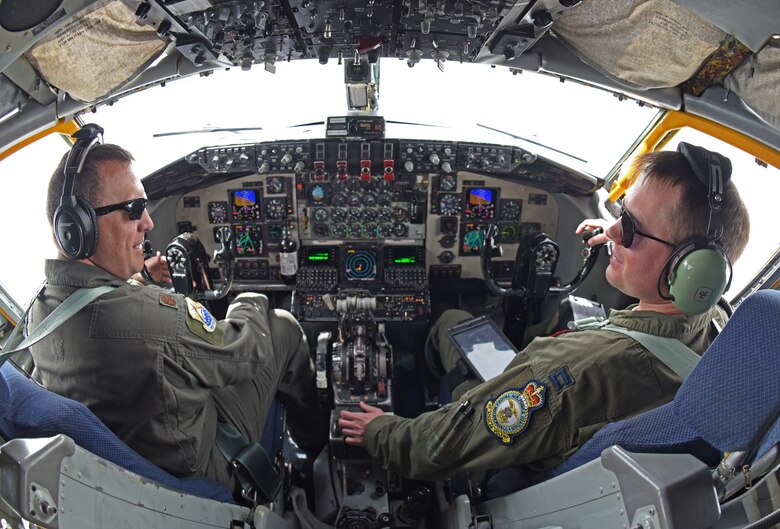 U.S. Air Force Maj. Jared Alden, 100th Air Refueling Wing Command Post chief of C2 operations, and U.S. Air Force Capt. Grant Starkweather, 351st Air Refueling Squadron pilot, discuss flight operations during the “FURIOUS 48” readiness exercise over the skies of England, April 24, 2019. Exercise scenarios were designed to ensure 100th ARW Airmen were fully prepared for potential contingencies in the wing’s area of responsibility. (U.S. Air Force photo by Airman 1st Class Brandon Esau)