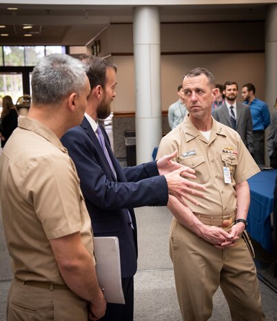 Naval Information Warfare Center Atlantic Executive Officer Christopher Miller talks with Chief of Naval Operations Adm. John Richardson during the CNO’s visit.