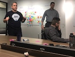 Team members for Magellan, including Airmen and Pivotal, Inc. employees, host a kick-off meeting for the project, which seeks to optimize how the U.S. Air Force allocates mobility aircraft globally, at Pivotal, Inc. offices in Chicago April 8.