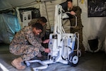 U.S. Navy corpsmen prepare the RadPRO X-ray machine during the capabilities display Nov. 27, 2018 at Camp Foster, Okinawa, Japan.