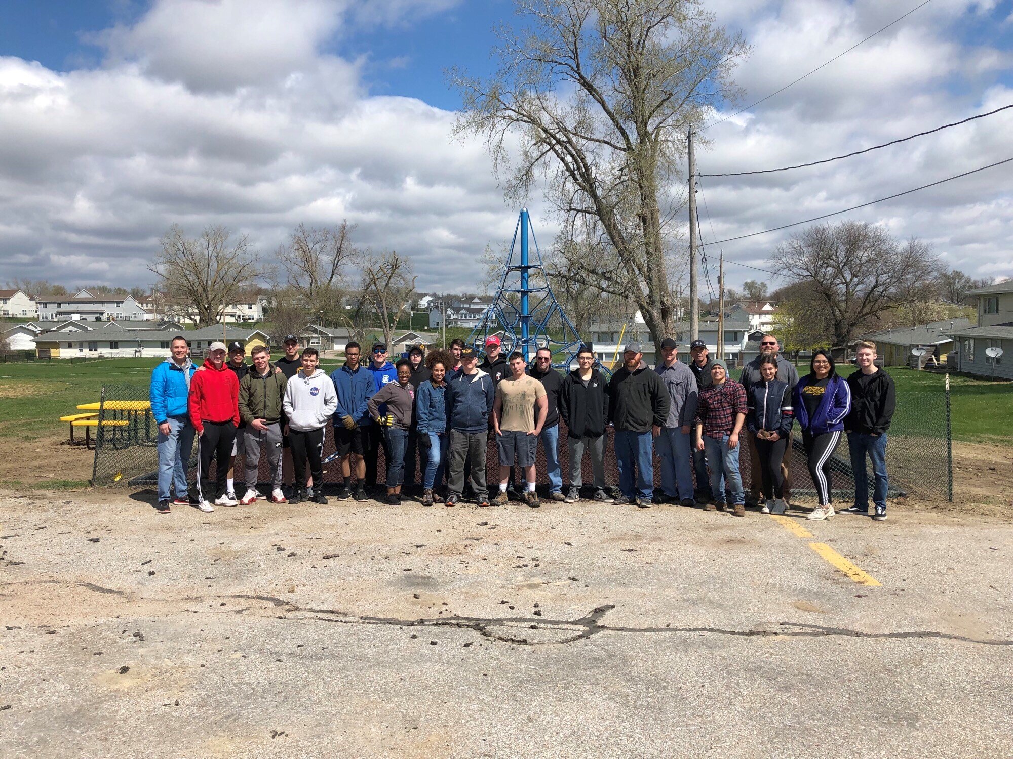 Members of the 55th Communications Group stand for a photo April 2019, at Peter Sarpy Elementary School, Bellevue. The school was in dire need of a new playground. (U.S. Air Force courtesy photo)