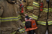 166th Airlift Wing Civil Engineer Squadron Firefighters carry a patient to a waiting ambulance during Operation Blue Skywalker at Delaware Air National Guard Base, Delaware, April 13, 2019. The firefighters were responding to the victims of a simulated airplane crash during a full-scale drill required by the Federal Aviation Administration every three years. (U.S. Air Force photo by Mr. Mitch Topal)