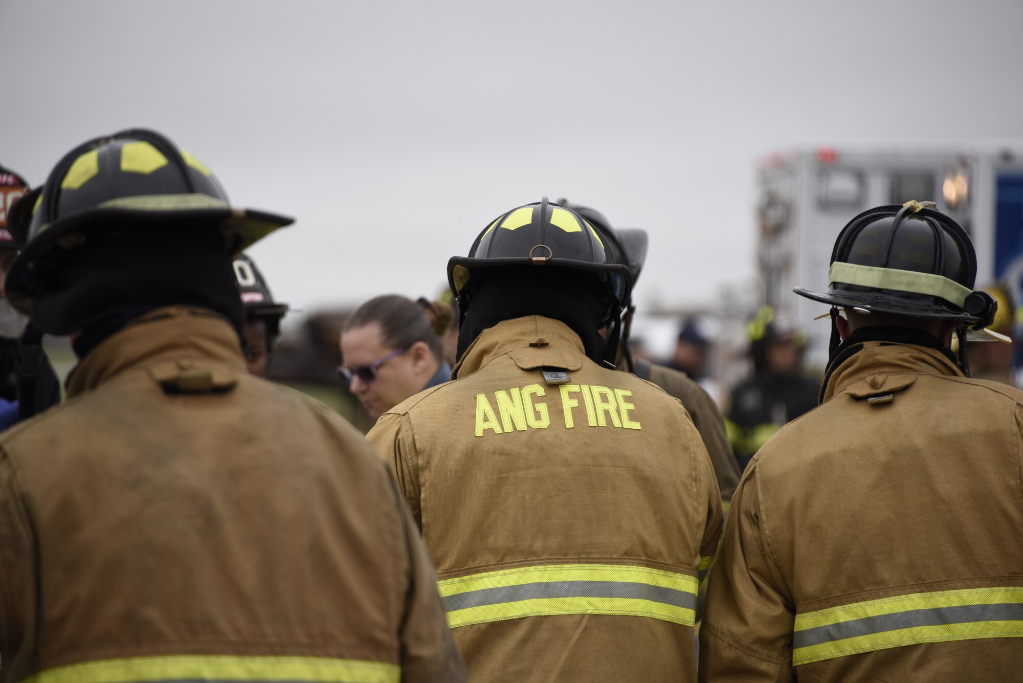 Firefighters of the 166th Civil Engineer Squadron huddle prior to the kick-off of Operation Blue Skywalker, April 10, 2019 at Delaware National Guard Base, Del. The operation, a simulated airplane crash, was a full-scale drill required by the Federal Aviation Administration to be held every three years. (U.S. Air Force photo by Mr. Mitch Topal)
