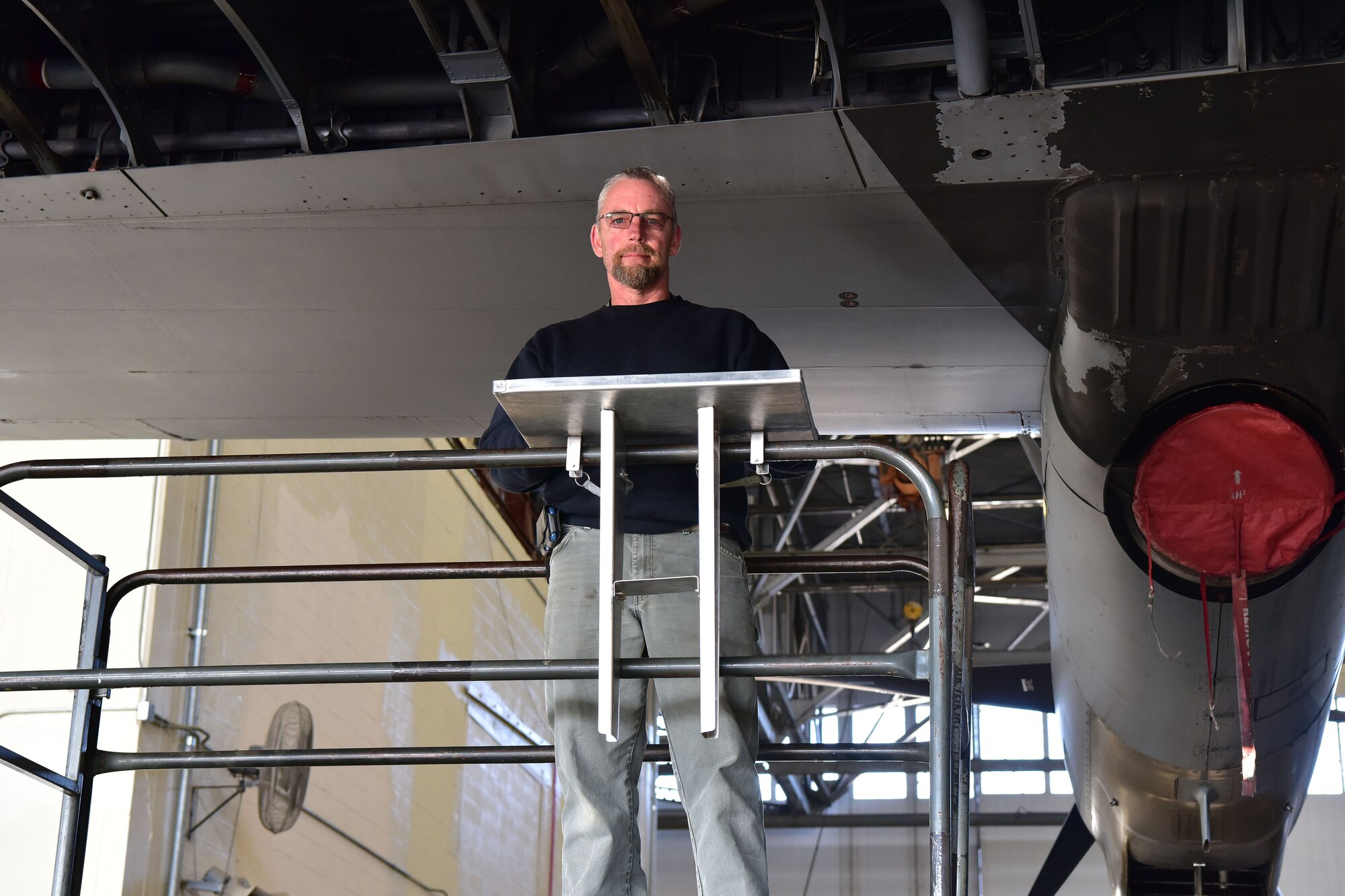Maintenance technician poses for a photo.