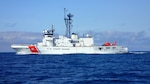 The Coast Guard Cutter Alex Haley is pictured before a Bering Sea patrol with a Coast Guard Air Station Kodiak MH-66 Dolphin helicopter embarked on the stern of the cutter, July 27th, 2018.  During Bering Sea patrols the cutter’s crew conducts boarding evolutions of the fishing fleet and can respond to search and rescue cases as needed.