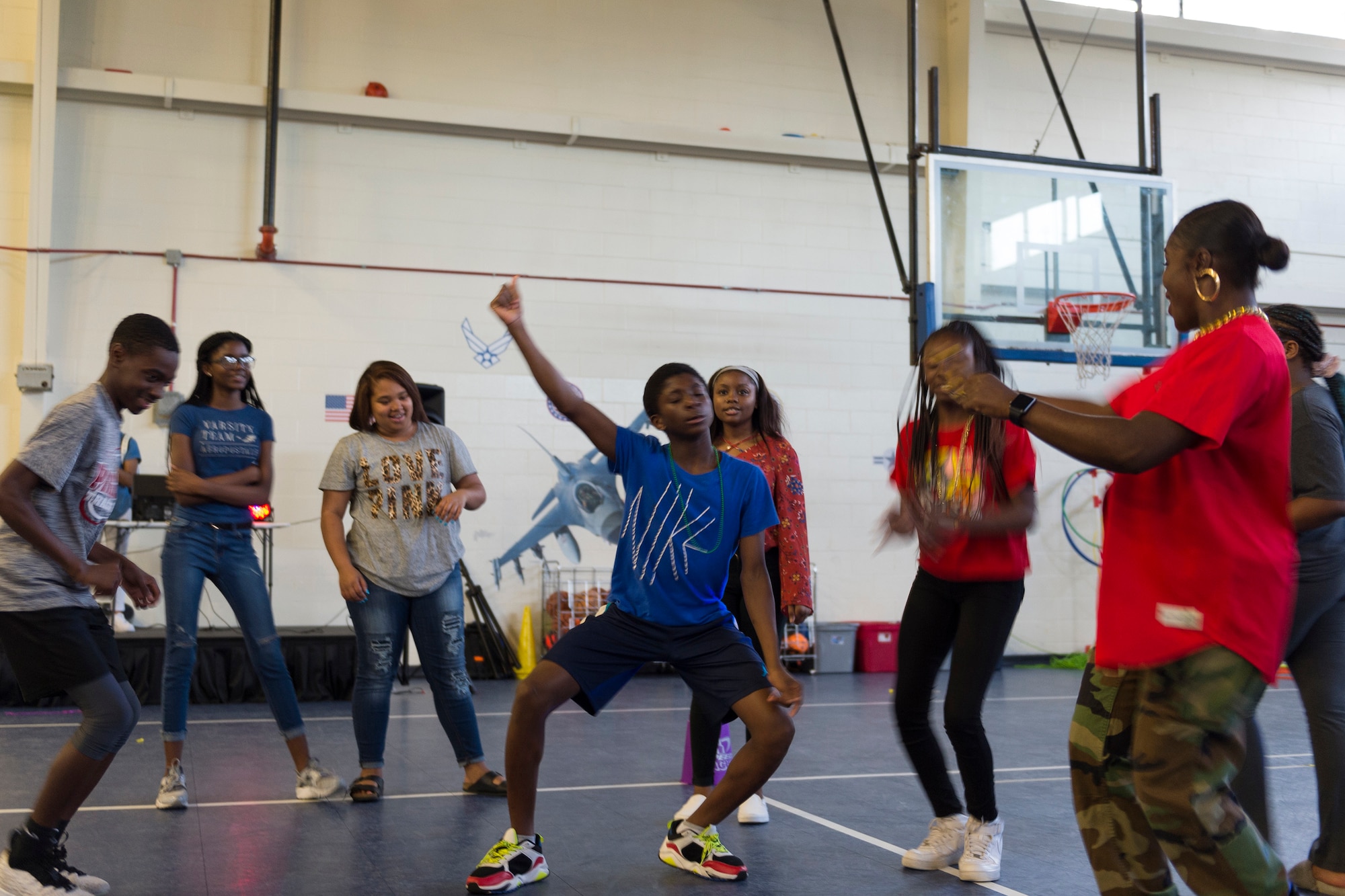 Participants dance during a youth dance party, April 12, 2019, at Moody Air Force Base, Ga. Team Moody showed its support for military children by hosting a number of events during Month of the Military Child in April. (U.S. Air Force photo by Airman 1st Class Hayden Legg)
