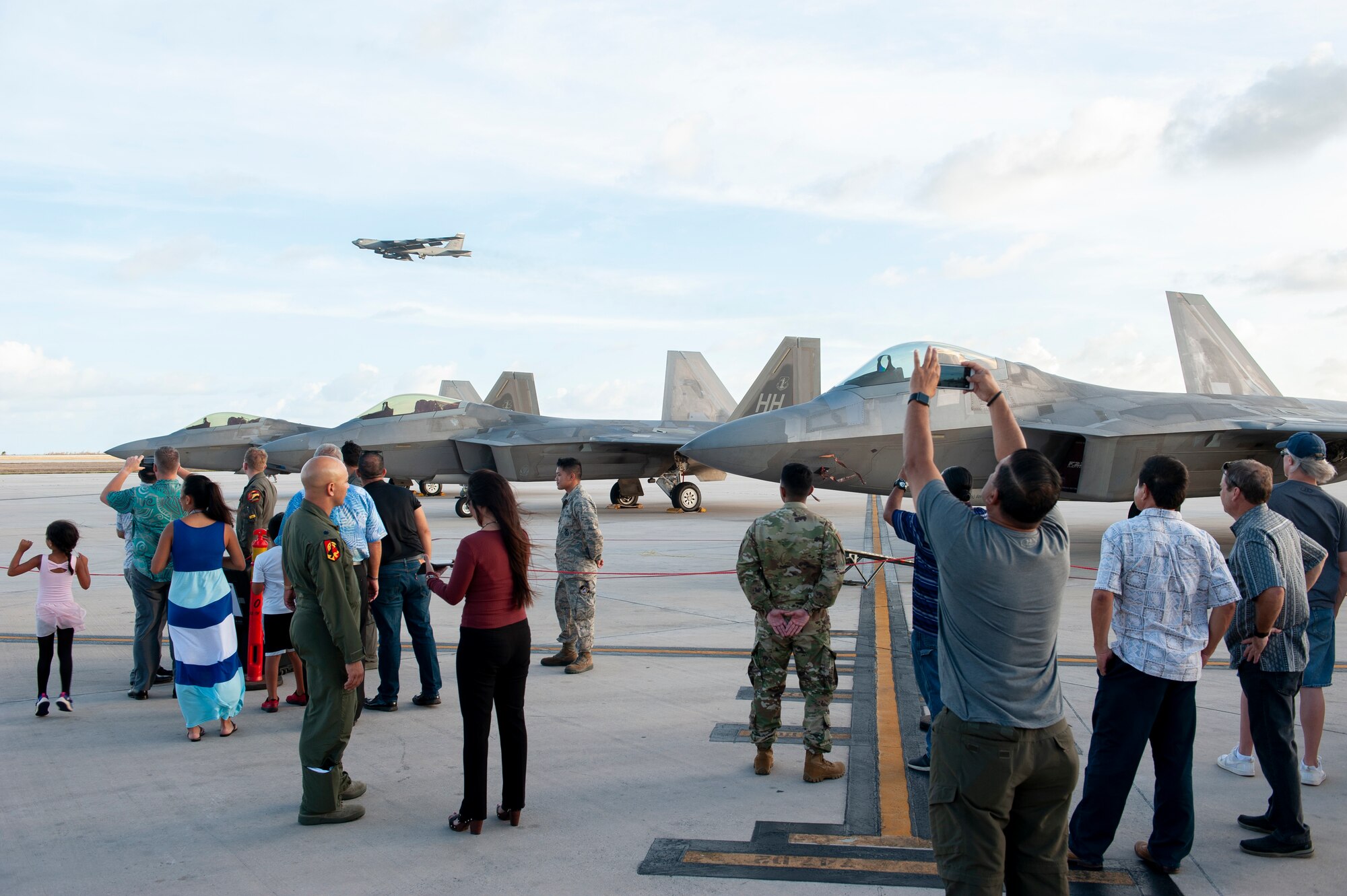 Saipan residents, to include government officials and first responders, attend a static display tour of F-22 Raptors at the Francisco C. Ada International Airport, Saipan, April 23, 2019.