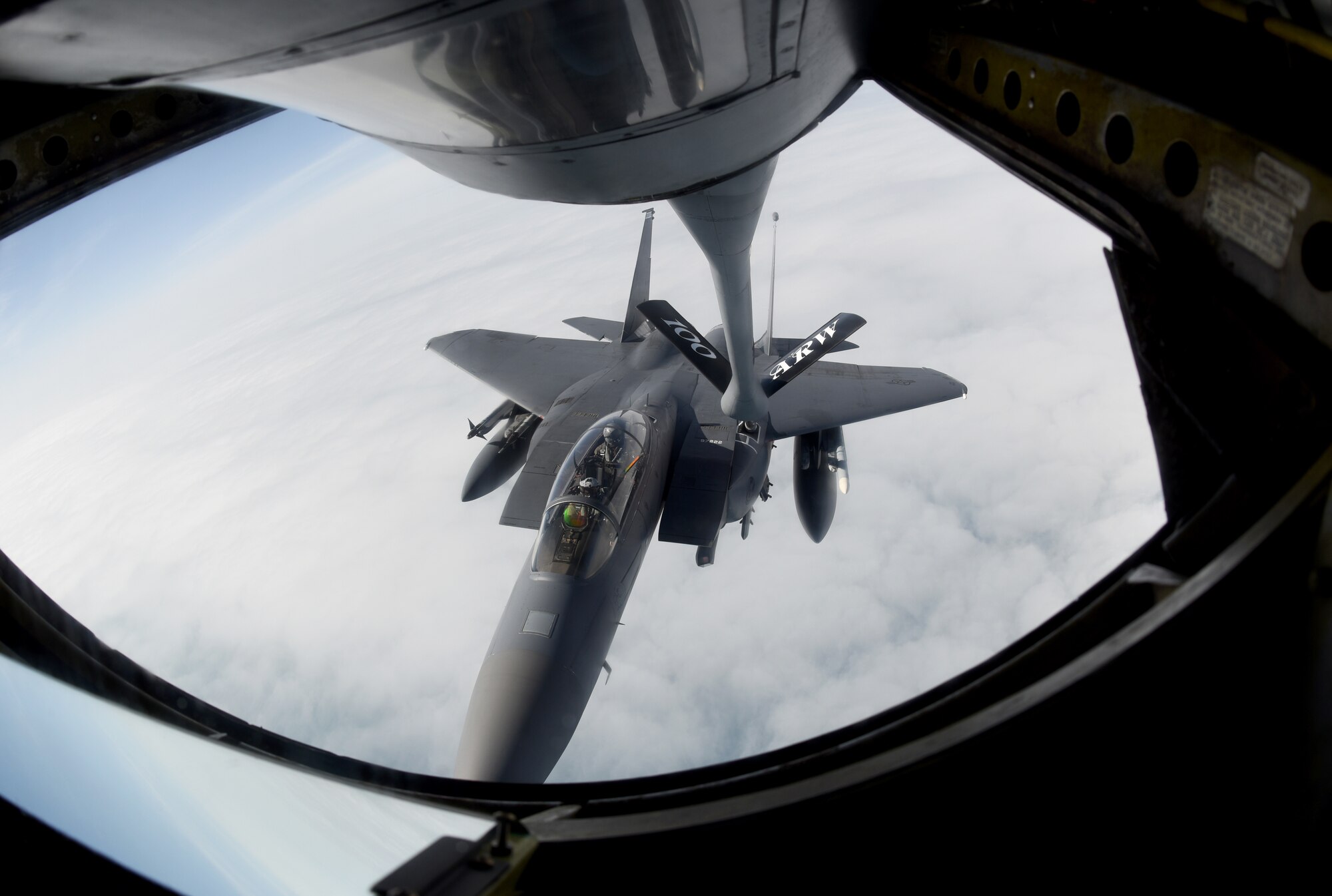 An F-15E Strike Eagle assigned to the 48th Fighter Wing at RAF Lakenheath, England, receives fuel from a 351st Air Refueling Squadron KC-135 Stratotanker at RAF Mildenhall during the “FURIOUS 48” readiness exercise over the skies of England, April 24, 2019. Exercise scenarios were designed to ensure 100th ARW Airmen were fully prepared for potential contingencies in the wing’s area of responsibility. (U.S. Air Force photo by Airman 1st Class Brandon Esau)