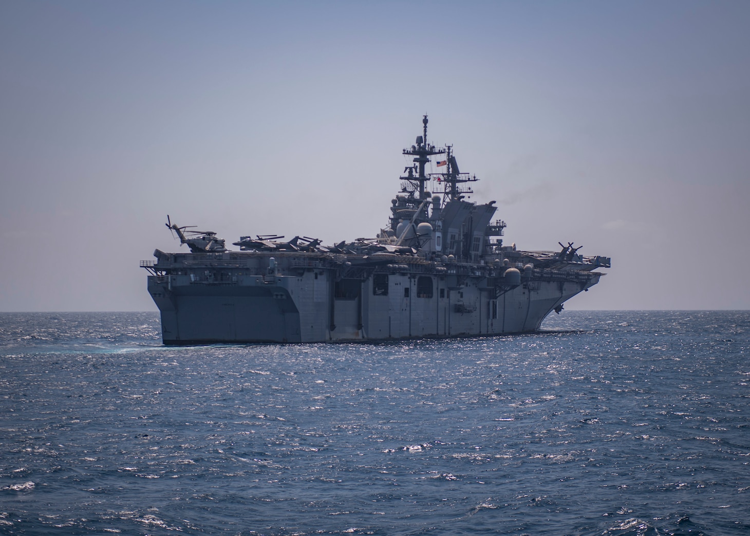 The amphibious assault ship USS America (LHA 6) underway in the Gulf of Aden. America is the flagship for the America Amphibious Ready Group and, with the embarked 15th Marine Expeditionary Unit, is deployed to the U.S. 5th Fleet area of operations in support of maritime security operations to reassure allies and partners and preserve the freedom of navigation and the free flow of commerce in the region.