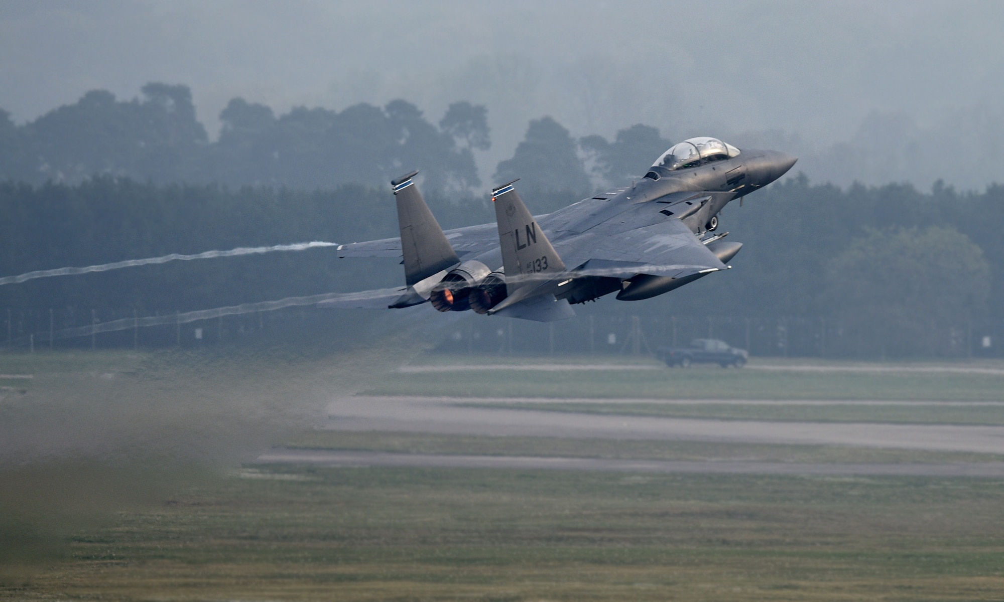 An F-15E Strike Eagle assigned to the 492nd Fighter Squadron takes off from the flight line at Royal Air Force Lakenheath, England, April 24, 2019. The 48th Fighter Wing is participating in a readiness exercise from 23-25 April focused on continuous operations over a 48-hour period. (U.S. Air Force photo by Airman 1st Class Madeline Herzog)