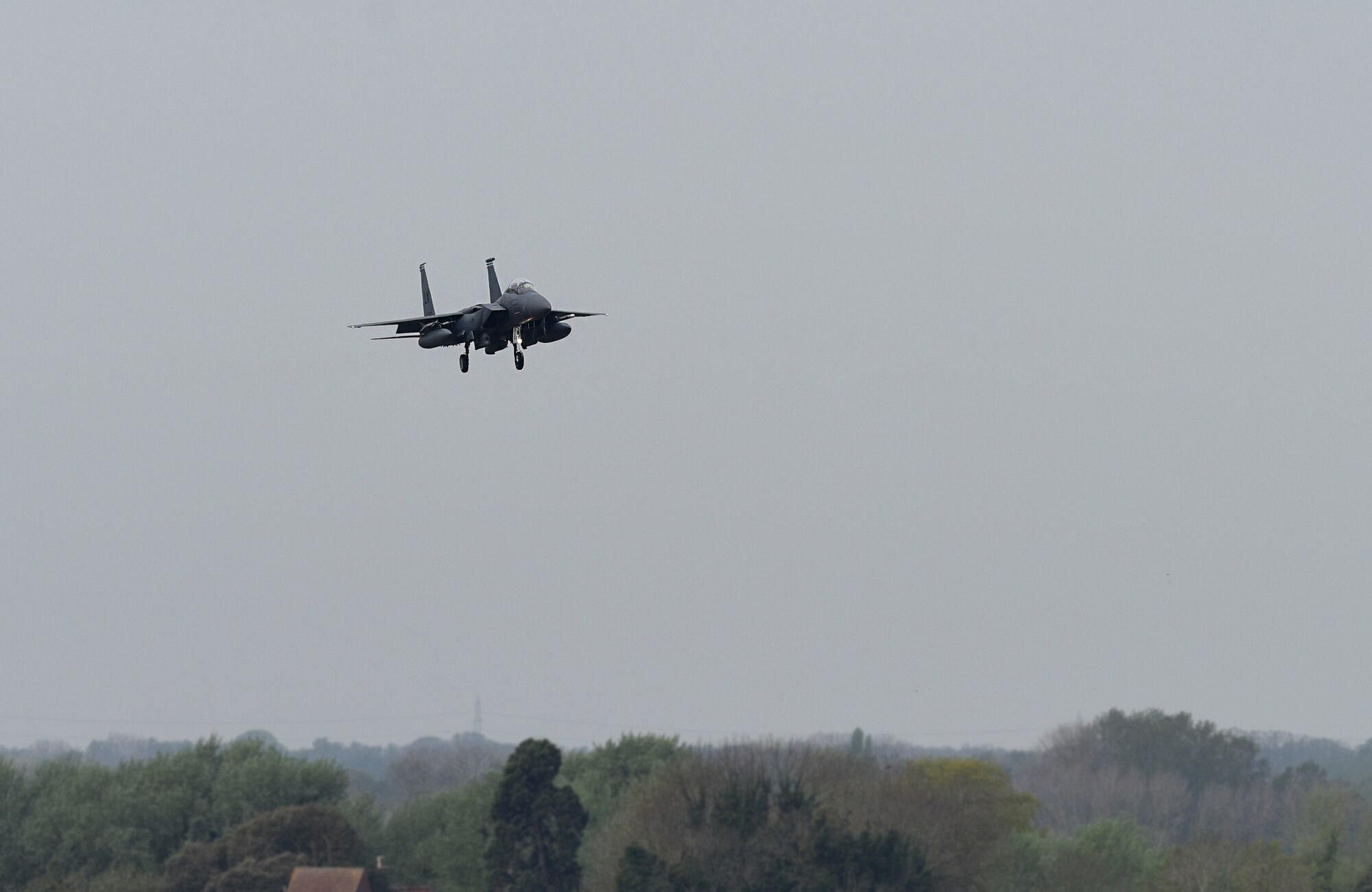 An F-15E Strike Eagle assigned to the 492nd Fighter Squadron approaches to land on the flight line at Royal Air Force Lakenheath, England, April 23, 2019. The 48th Fighter Wing is participating in a readiness exercise from 23-25 April focused on continuous operations over a 48-hour period. (U.S. Air Force photo by Airman 1st Class Madeline Herzog)