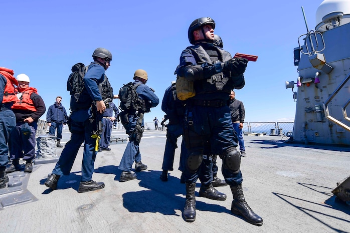 U.S. Navy and Georgian Coast Guard sailors board the Arleigh Burke-class guided-missile destroyer USS Ross (DDG 71)