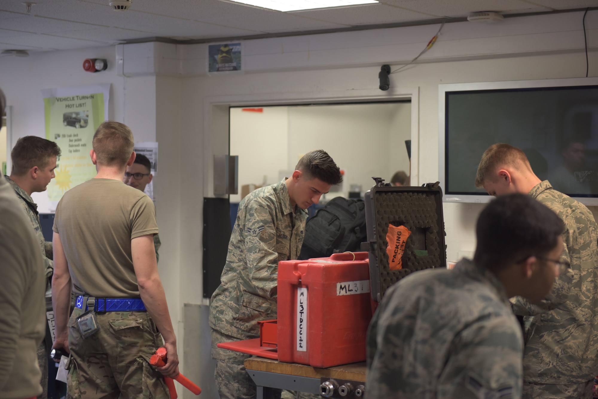 U.S. Air Force Airman 1st Class Anthony Hudgins, 100th Aircraft Maintenance Squadron air space maintenance apprentice, inspects his tools at RAF Mildenhall, England, April 24, 2019. During Mission Assurance Exercise 19-01, Airmen tested their ability to survive and operate in wartime conditions, as well as showcased their ability to generate combat airpower in a wide range of environments and scenarios. (U.S. Air Force photo by Senior Airman Benjamin Cooper)
