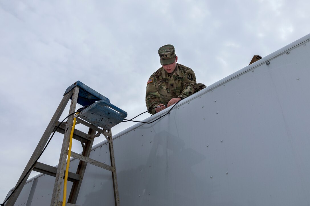 Signal Soldiers Practice Shooting Satellite