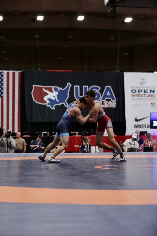 Mason Hartshorn (right) wrestles and wins against Haiden Drury during the US Marine Corps Open Wrestling Championships in Las Vegas, April 25, 2019. USA Wrestling has more than 226,000 members. Each year, USA Wrestling charters over 4,500 wrestling clubs and sanctions over 2,100 local, state, regional and national competitions. US Marines partner with and attend organizational championships such as the US Marine Corps Open Championships to support student athletes, coaches and their communities, to inform young people about opportunities within the Marine Corps, and to continue to foster the fighting spirit that Marines and athletes share. (US Marine Corps photo by Cpl. Naomi May)