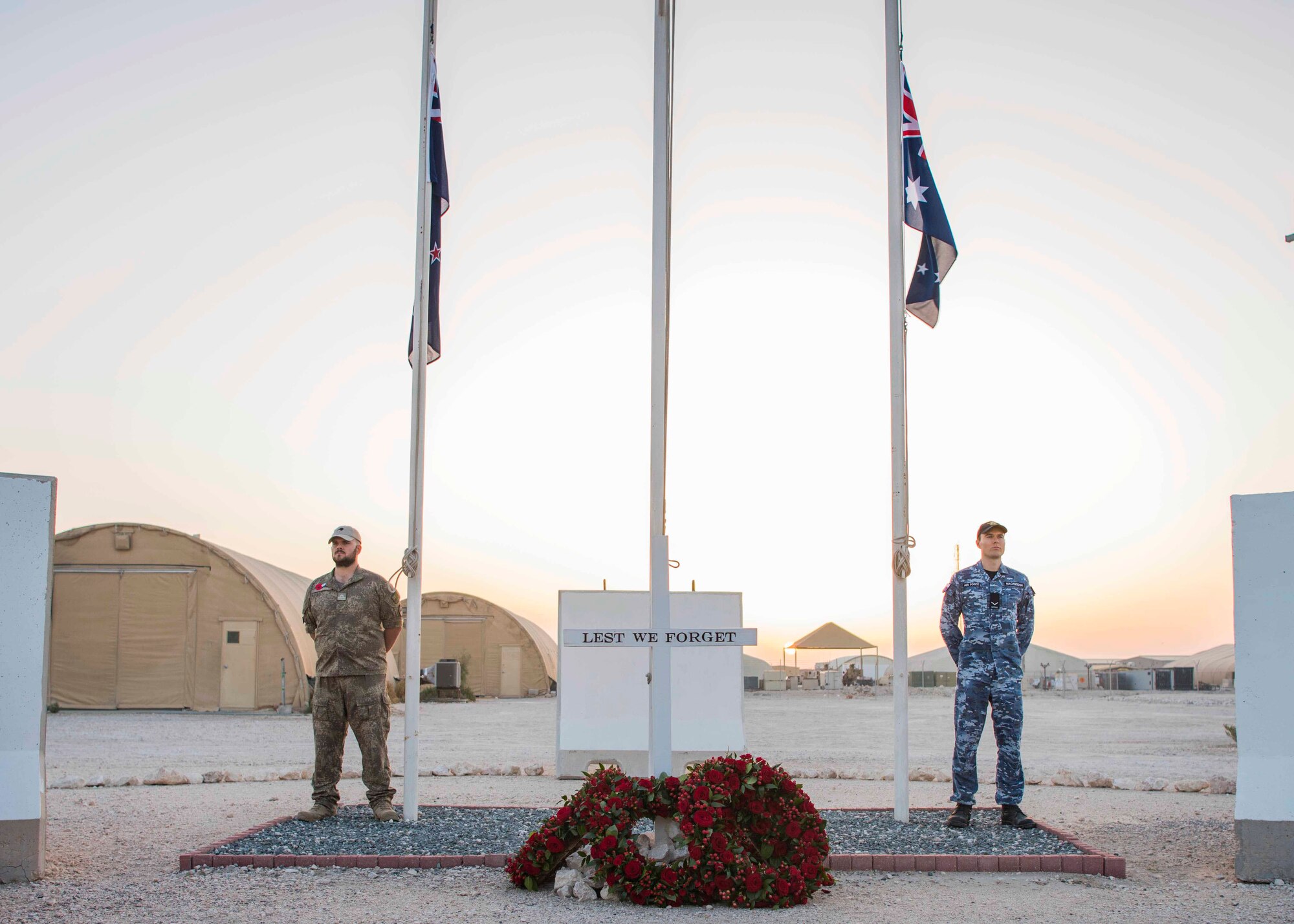 Representatives of Australia and New Zealand stand vigil during an ANZAC Day dawn service.