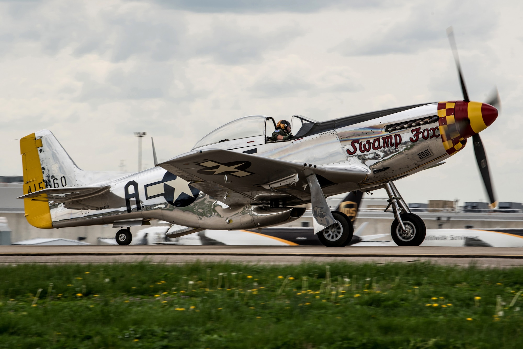 Robert “R.T.” Dickson Jr. arrives at the Kentucky Air National Guard Base in Louisville, Ky., April 11, 2019, with "Swamp Fox," his restored P-51 Mustang aircraft. The aircraft, which was in town to fly in the 2019 Thunder Over Louisville air show, was once assigned to the Kentucky Air Guard when the Mustang served as the unit’s primary airframe from 1947 to 1953. (U.S. Air National Guard photo by Staff Sgt. Joshua Horton)