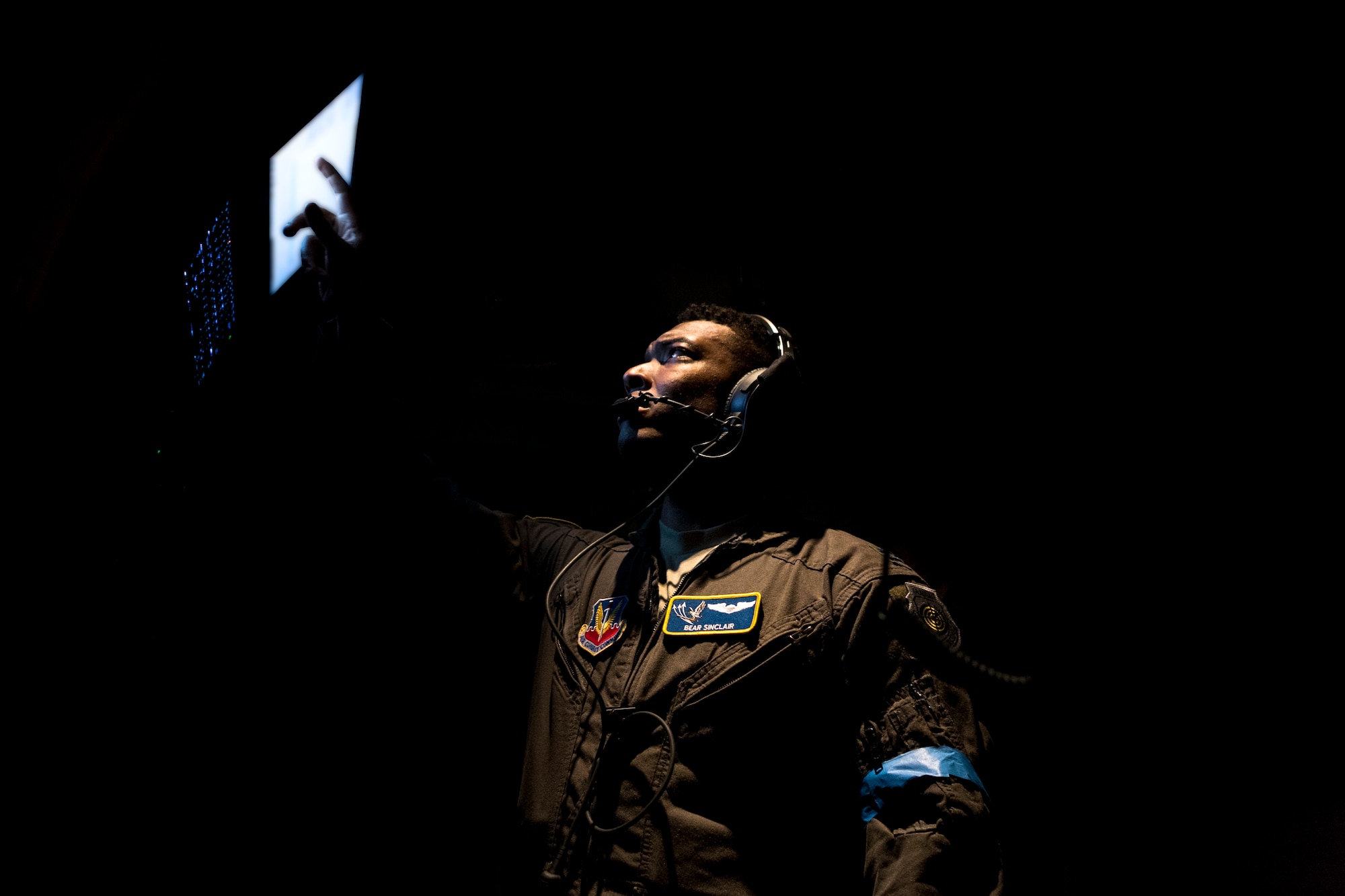 An Airman analyzes a computer