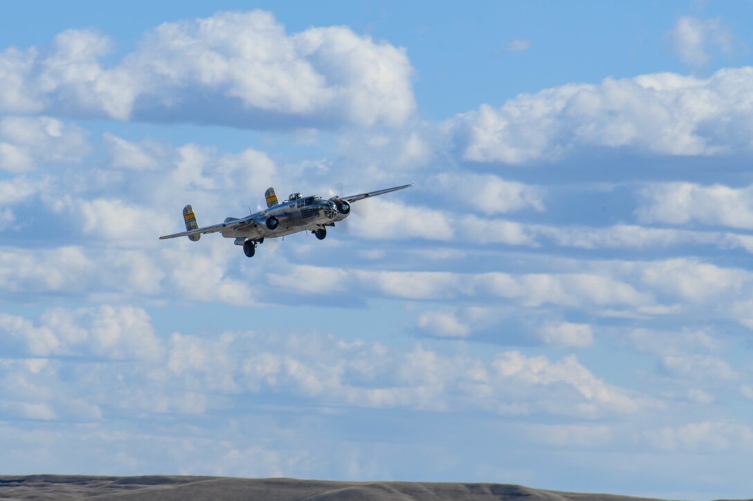 A B-25 Mitchell takes off from the flightline