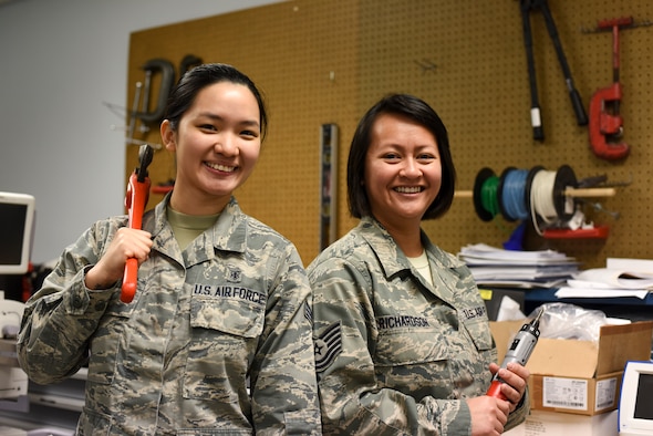 Tech. Sgt. Kristine Richardson, 39th Medical Support Squadron biomedical equipment NCO in charge, right, and Senior Airman Kirsten Lee, 39th MDSS biomedical equipment technician, left, pose for a photo April 18, 2019, at Incirlik Air Base, Turkey.