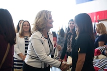 Mrs. Rebecca Cederholm, the U.S. Marine Corps Forces Command Deputy Commander’s wife, receives a care package from Second Lady of the United States Karen Pence during a town hall event honoring active-duty spouses at Naval Station Norfolk, Norfolk, Virginia, April 24, 2019. The town hall was held to honor military spouses and children of deployed or deploying service members. During her visit, Second Lady Pence delivered care packages, spoke with spouses, and highlighted the programs and services that military service organizations such as the USO provide. (U.S. Marine Corps photo by Sgt. Jessika Braden/released