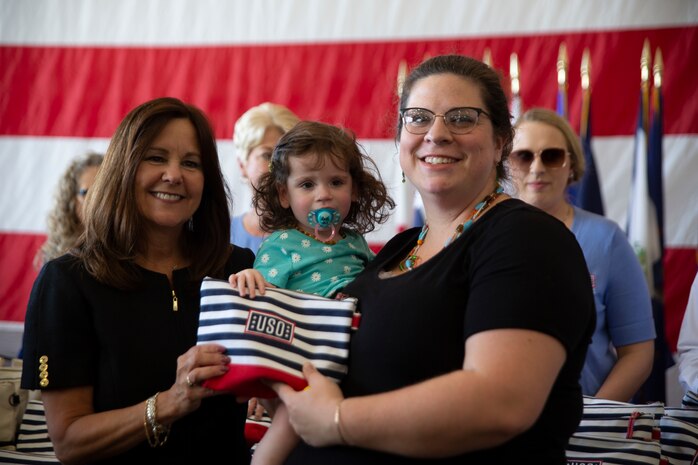 Second Lady of the United States Karen Pence meets with a military spouse and her daughter at the conclusion of a town hall event honoring active-duty spouses at Naval Station Norfolk, Norfolk, Virginia, April 24, 2019. The town hall was held to honor military spouses and children of deployed or deploying service members. During her visit, Second Lady Pence delivered care packages, spoke with spouses, and highlighted the programs and services that military service organizations such as the USO provide. (U.S. Marine Corps photo by Sgt. Jessika Braden/released)