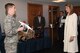 1st Lt. Cody Locke, lead for rapid prototyping, Force Protection Division, speaks to U.S. Rep. Lori Trahan about counter-small unmanned aerial systems technology during a demonstration at Hanscom Air Force Base, Mass., April 25.