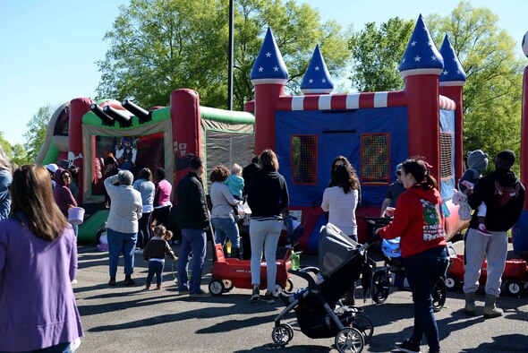 Team BLAZE members celebrate spring during the 14th Force Support Squadron Spring Fling and Easter Egg Hunt April 20, 2019, on Columbus Air Force Base, Miss. The spring event featured numerous activities including egg hunts for various age groups, a brunch buffet, bouncy castles and more. (U.S. Air Force photo by Airman Hannah Bean)