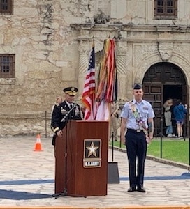 Lt. Gen. Jeffrey S. Buchanan, commanding general for U.S. Army North (Fifth Army), recognizes Tech. Sgt. Ryan Fillweber during the Army Day at the Alamo celebration April 23, for his actions during the April 22 Texas Cavaliers River Parade. Fillweber, a military ambassador during the 2019 Fiesta San Antonio celebrations, jumped off his barge and into the San Antonio River to save a woman who had fallen head-first into the river and was unable to right herself.