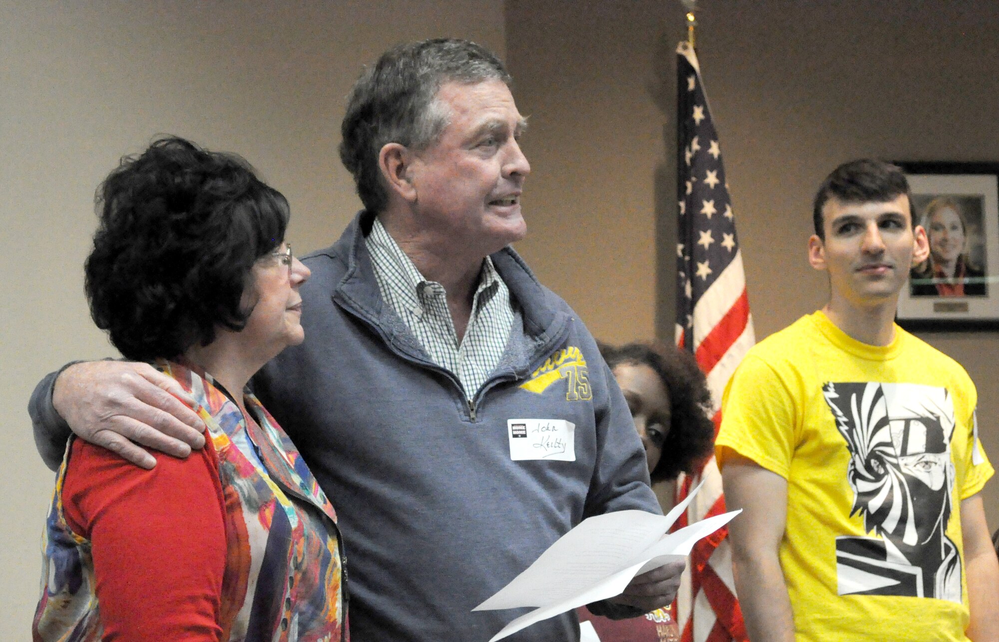 Retired U.S. Navy Capt. John Keilty thanks Airmen and Sailors in the audience, along with Home Away from Home program founder Pam Kloiber, for their acts of heroism at the beginning of his speech for the Home Away from Home: Meet the Hero Night series April 17 at the Midwest City Chamber of Commerce. The next Meet the Hero Night to be held in August will feature retired Col. Dennis D’Angelo, director of the 448th Supply Chain Management Wing. (U.S. Air Force photo/Megan Prather)