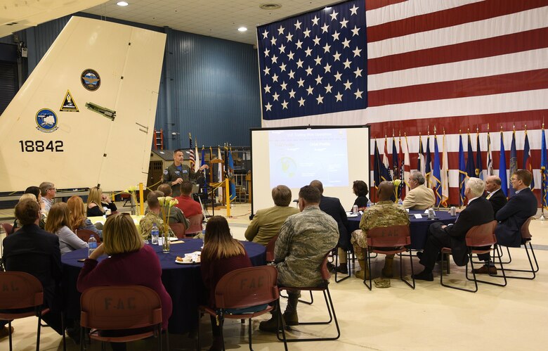 U.S. Navy Capt. Michael Black, commander of Strategic Communications Wing ONE and Task Force 124, gives members of the Tinker Honorary Commanders Program an overview of the Navy mission April 17. (U.S. Air Force photo/April McDonald)