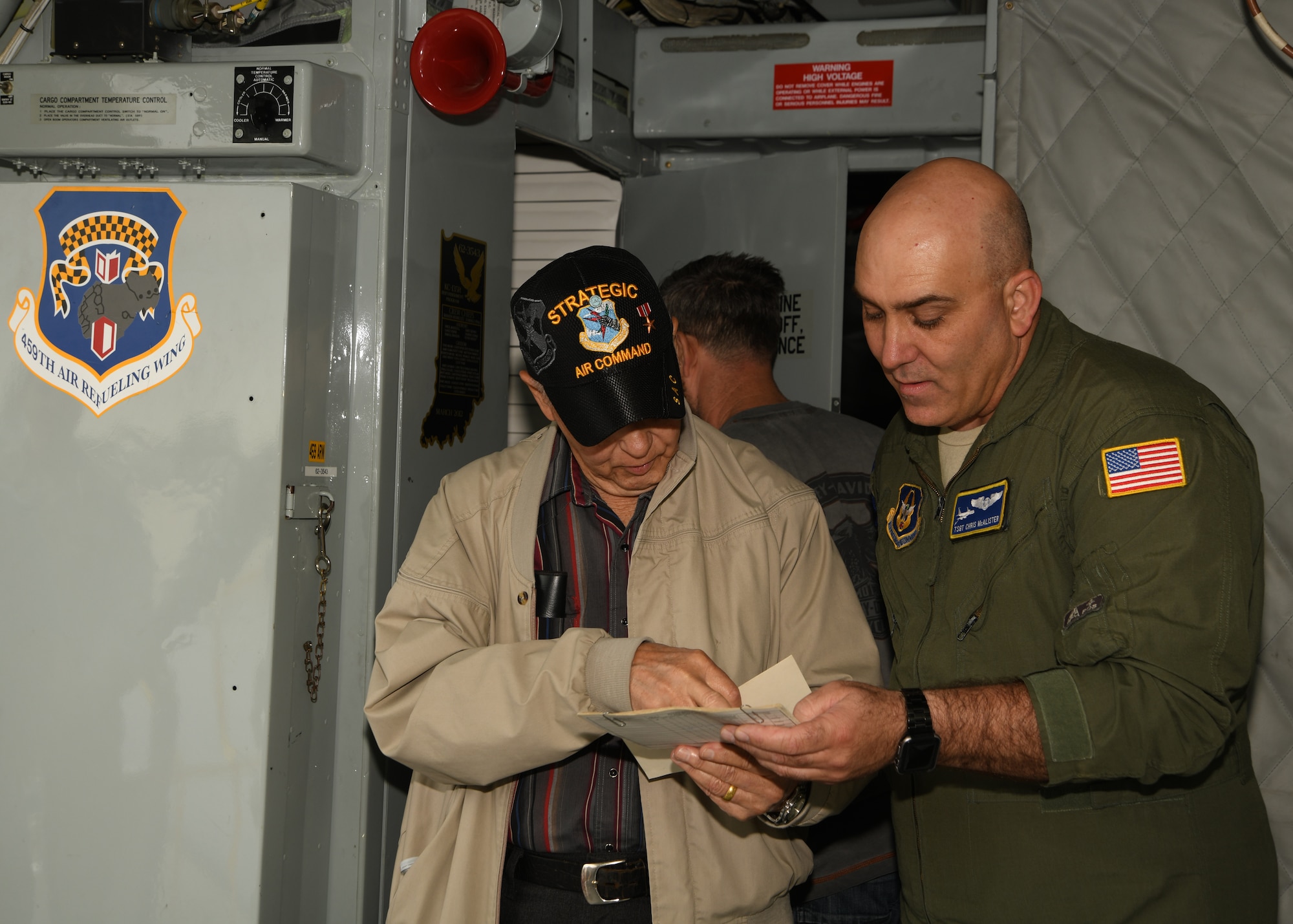 Master Sgt. Bill Fuselier, retired, looks at the cockpit of his former aircraft during a tour of a KC-135 Stratotanker, April 25, 2019 at Joint Base Andrews, Md. Fuselier is a Vietnam War veteran, Bronze Star recipient and former crew chief. He came to the 459th to visit the same aircraft he worked on when he was on active duty over 40 years ago. (U.S Air Force photo by Staff Sgt. Cierra Presentado)