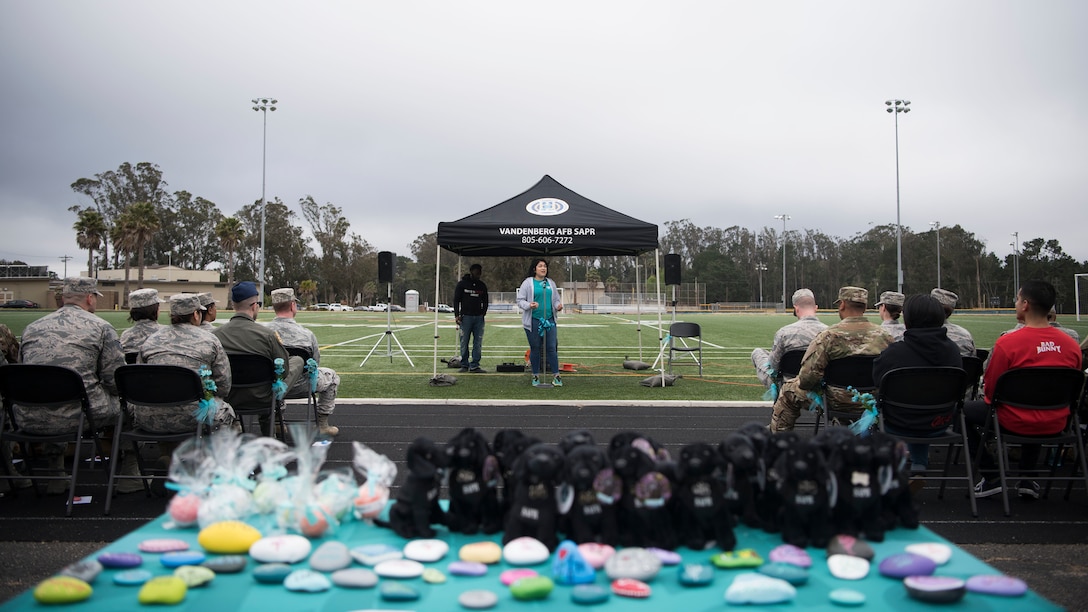 Teresa Loya, 30th Space Wing Sexual Assault Prevention and Response victim advocate, speaks during the Survivor Vigil April 19, 2019, at Vandenberg Air Force Base, Calif. The vigil, hosted by SAPR office, highlighted guest speaker’s experiences with sexual assault and the stories of how they overcame their obstacles. The ceremony concluded with a walk around the track, allowing member’s time to reflect on the ceremony. (U.S. Air Force photo by Airman 1st Class Hanah Abercrombie)