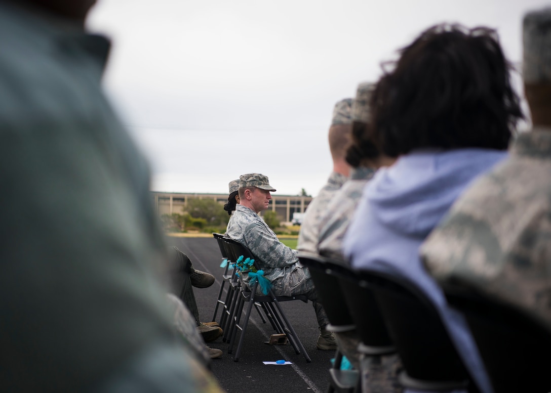 Col. Bob Reeves, 30th Space Wing vice commander, listens as Edward Wilson, guest speaker, provides a spoken word performance during Sexual Assault Prevention and Response’s Survivor Vigil April 19, 2019, at Vandenberg Air Force Base, Calif. The performance was part of the Difference Makers “Cultivating Difference Makers” presentation. (U.S. Air Force photo by Airman 1st Class Hanah Abercrombie)