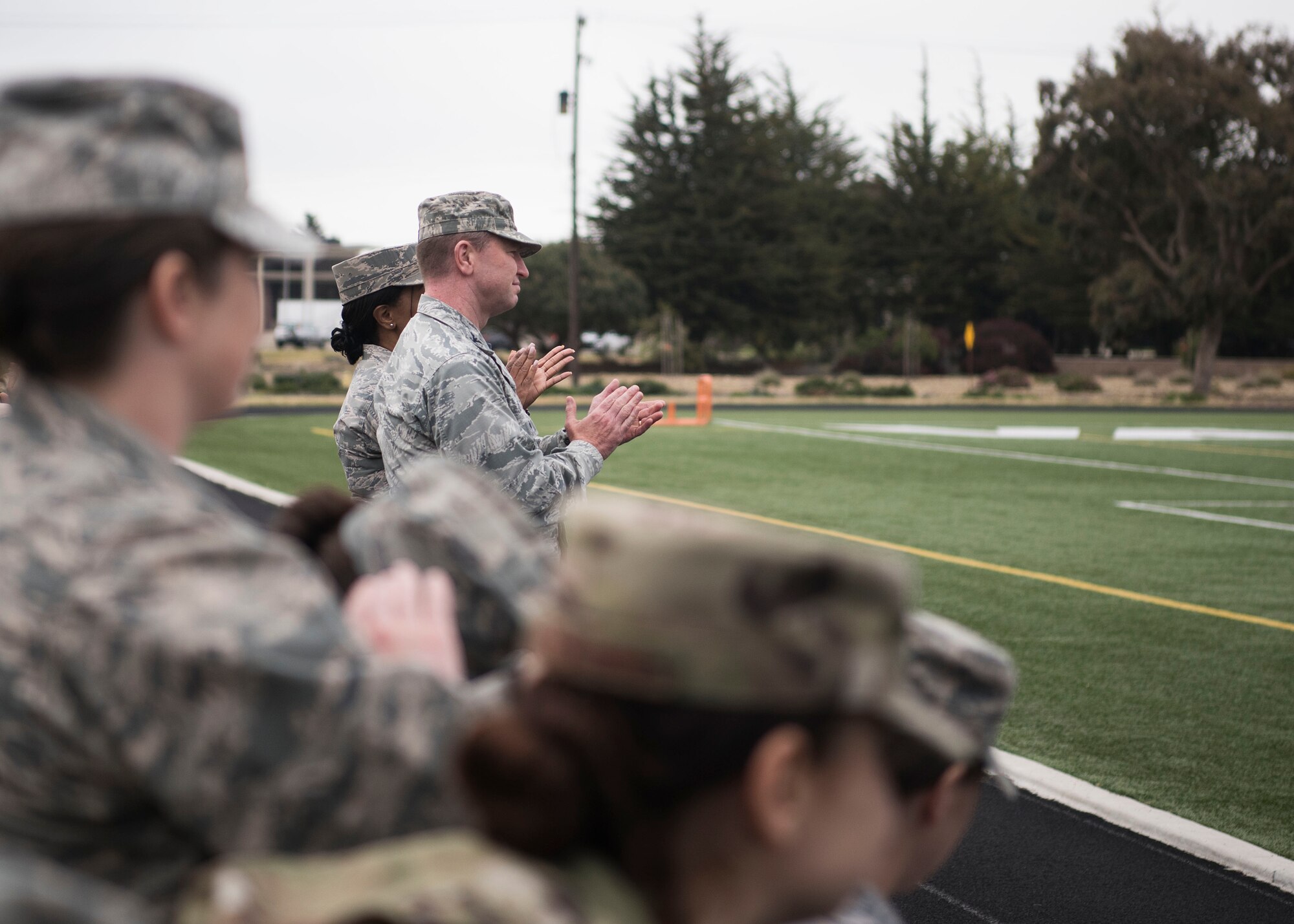 Col. Bob Reeves, 30th Space Wing vice commander, applauds following Edward Wilson’s, guest speaker from Difference Makers, spoken word performance during the Sexual Assault Prevention and Response’s Survivor Vigil April 19, 2019, at Vandenberg Air Force Base, Calif. The SAPR hosts the vigil annually to honor sexual assault survivors and to pay tribute to those who have not come forward. (U.S. Air Force photo by Airman 1st Class Hanah Abercrombie)