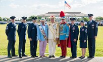 Members of the 2019 Fiesta royalty and commission board stand with senior leaders with 37th Training Wing, and Air Education and Training Command April 19, 2019, during the annual Fiesta Basic Military Training Parade at Joint Base San Antonio-Lackland, Texas.
