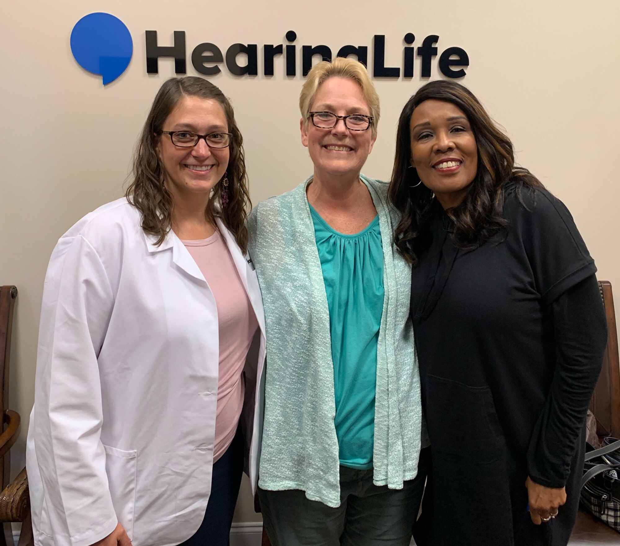 Dr. Linnea Herbert, Lynn Hill and Martha Johnson take time for a photo following the fitting of Hill’s government-funded hearing aid. (Courtesy photo)