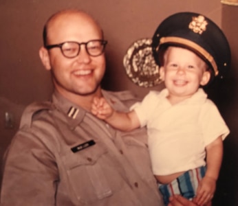 Army Capt. (Dr.) Arnold Mueller holds 2-year-old Steve Mueller. Steve Mueller was born in old-BAMC when his father was stationed at BAMC in 1958.