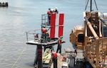 U.S. Coast Guard Cutter Pamlico and crew repair the center entrance range of the Mississippi River at Southwest Pass, July 6, 2011. Pamlico, a 160-foot inland construction tender, homeported in New Orleans, is manned by 16 crewmembers, who construct fixed aids to navigation from Baton Rouge to the Southwest Pass of the Mississippi River and its surrounding waterways.