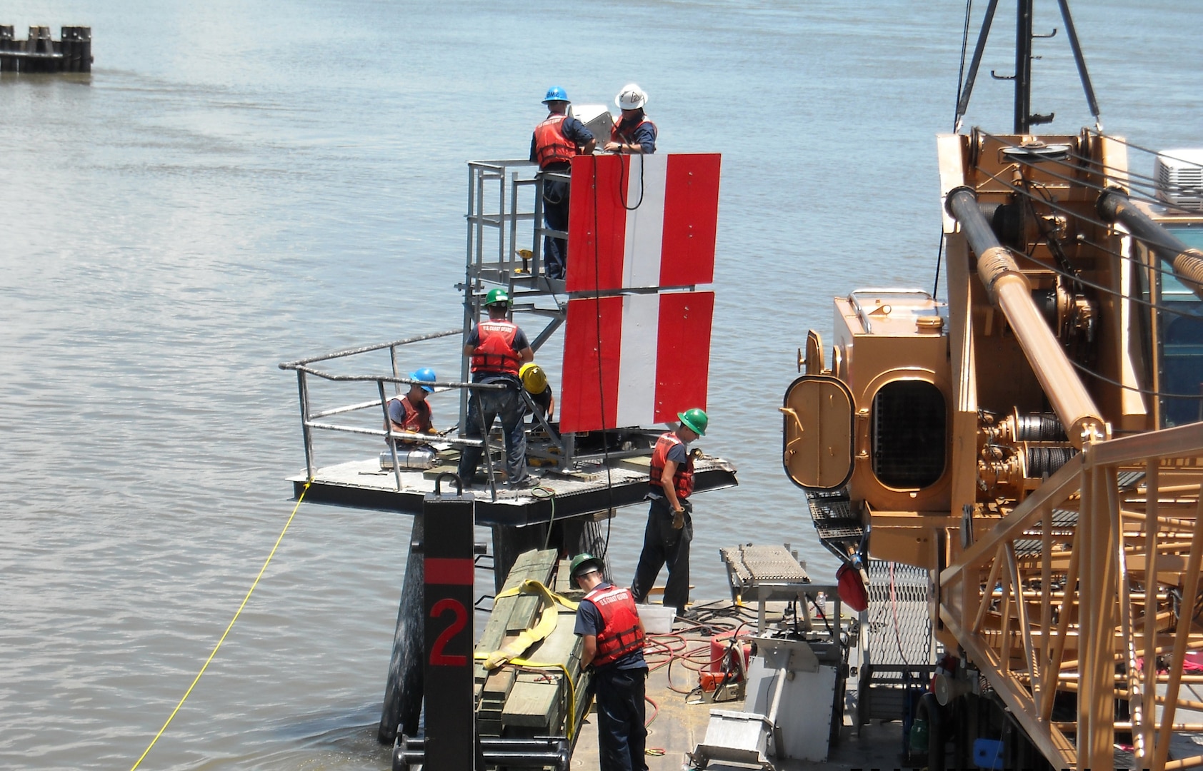 U.S. Coast Guard Cutter Pamlico and crew repair the center entrance range of the Mississippi River at Southwest Pass, July 6, 2011. Pamlico, a 160-foot inland construction tender, homeported in New Orleans, is manned by 16 crewmembers, who construct fixed aids to navigation from Baton Rouge to the Southwest Pass of the Mississippi River and its surrounding waterways.