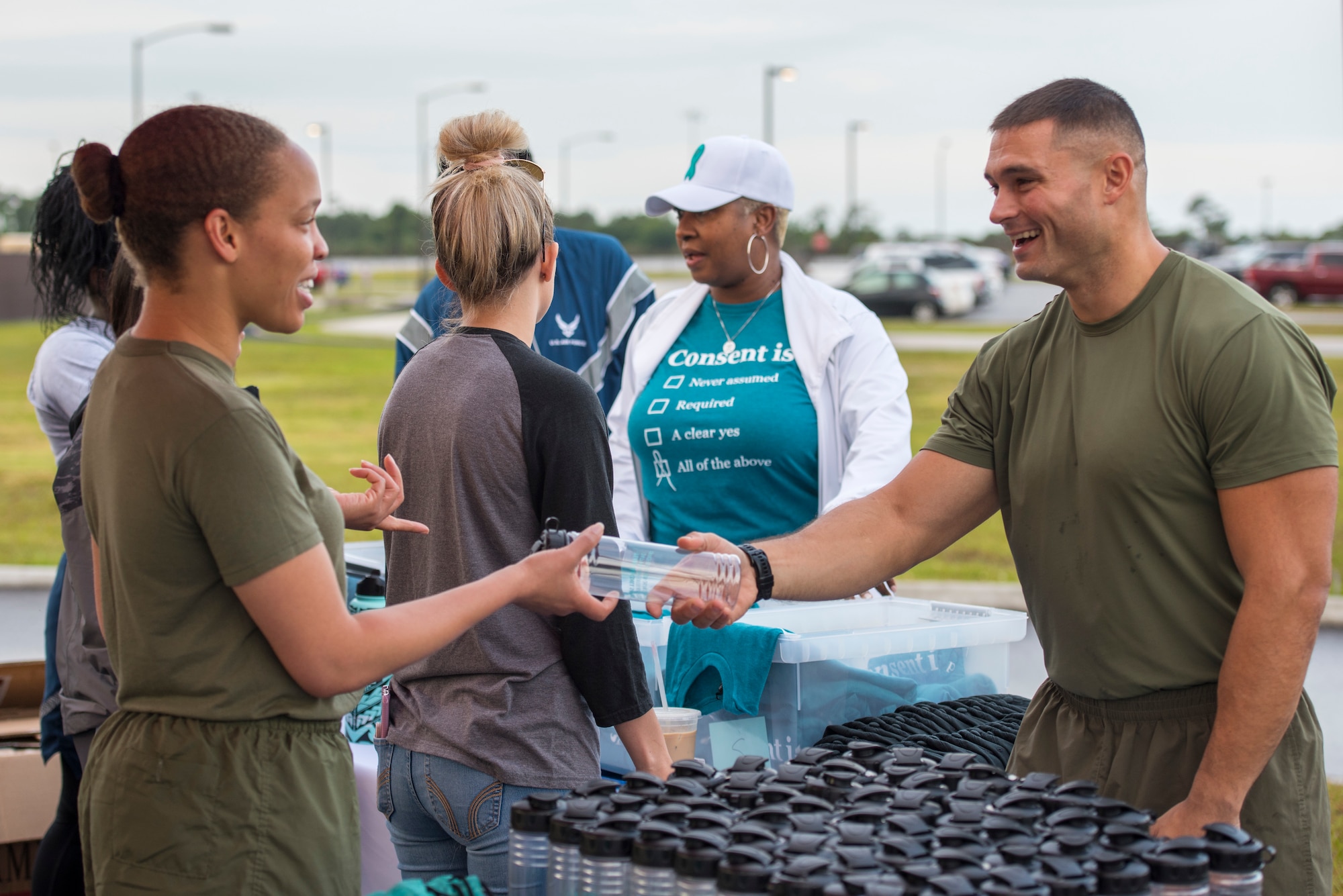 Two U.S. Marines volunteer for a Sexual Assault Prevention and Response 5K run at MacDill Air Force Base, Fla., April 5, 2019.