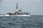 Coast Guard Cutter Flying Fish, an 87-foot patrol boat homeported in Virginia Beach, Virginia, steams north alongside the Chesapeake Bay Bridge-Tunnel off Virginia Beach, Feb. 15, 2018. The cutter’s crew of 12 primarily conducts search and rescue and marine fisheries enforcement missions in the lower Chesapeake Bay and off Virginia’s coast.