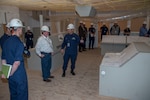 Adm. Charles W. Ray, vice commandant of the Coast Guard, tours a replica of the first offshore patrol cutter's bridge at the Eastern Shipbuilding Group shipyard in Panama City, Florida, Thursday, March 14, 2019. The OPCs will complement the capabilities of the Coast Guard’s national security cutters, fast response cutters, and polar security cutters as an essential element of the Department of Homeland Security’s layered security strategy.