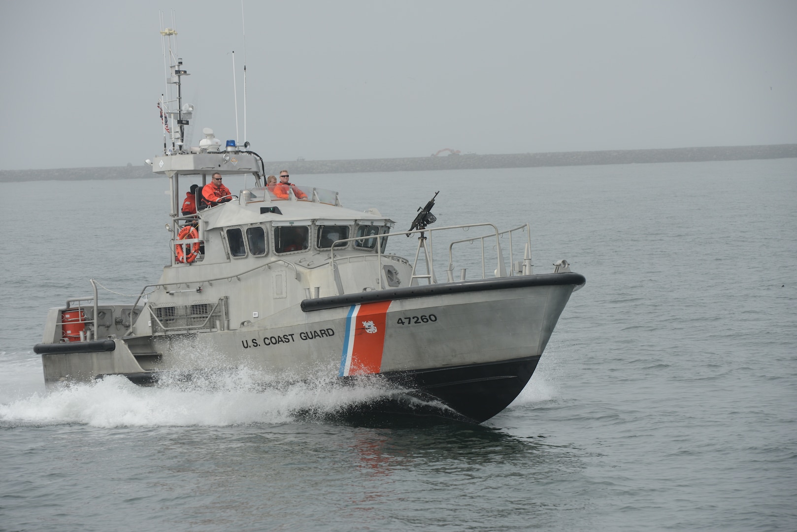 A Coast Guard boat crew aboard a 47-foot Motor Life Boat with a mounted M-240 weapon system returns to its base in Ilwaco, Wash., after a training exercise was cancelled, Aug. 29, 2018.

The live-fire training exercise was cancelled because the required three miles of visibility was not available.