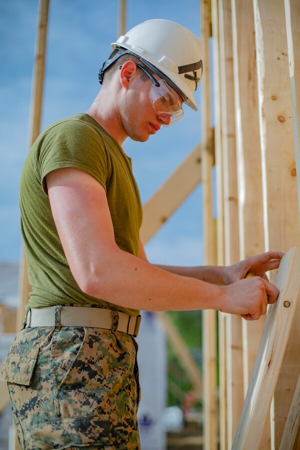 U.S. Marine Corps Lance Cpl. Keagan J. Brown, a combat engineer with Company C, 6th Engineer Support Battalion, 4th Marine Logistics Group, marks a wooden plank during the Innovative Readiness Training Camp Kamassa near Crystal Springs, Miss., on April 24, 2019. The purpose of the Department of Defense’s IRT program is to support the community by pairing military members with civil projects that benefit the community, and enables Marine Reserve units to increase their efficiency and performance. (U.S. Marine Corps photo by Lance Cpl. Jose Gonzalez)