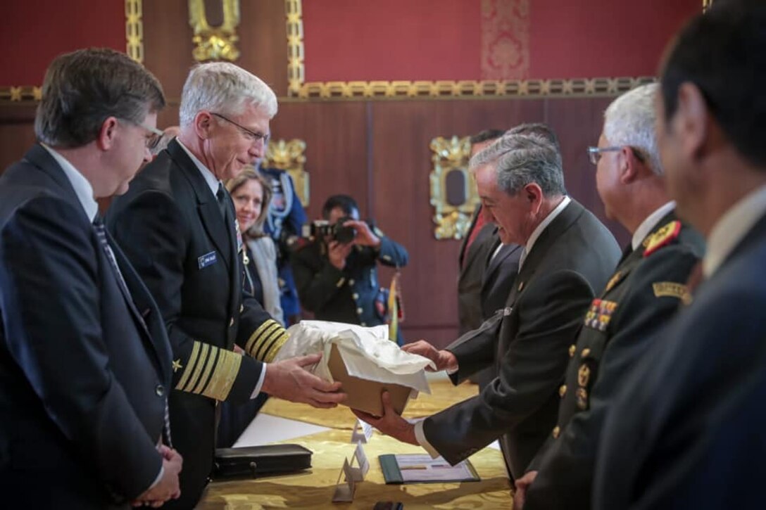 U.S. Navy Adm. Craig Faller, commander of U.S. Southern Command, meets with Ecuador's Minister of Defence, General Oswaldo Jarrín.