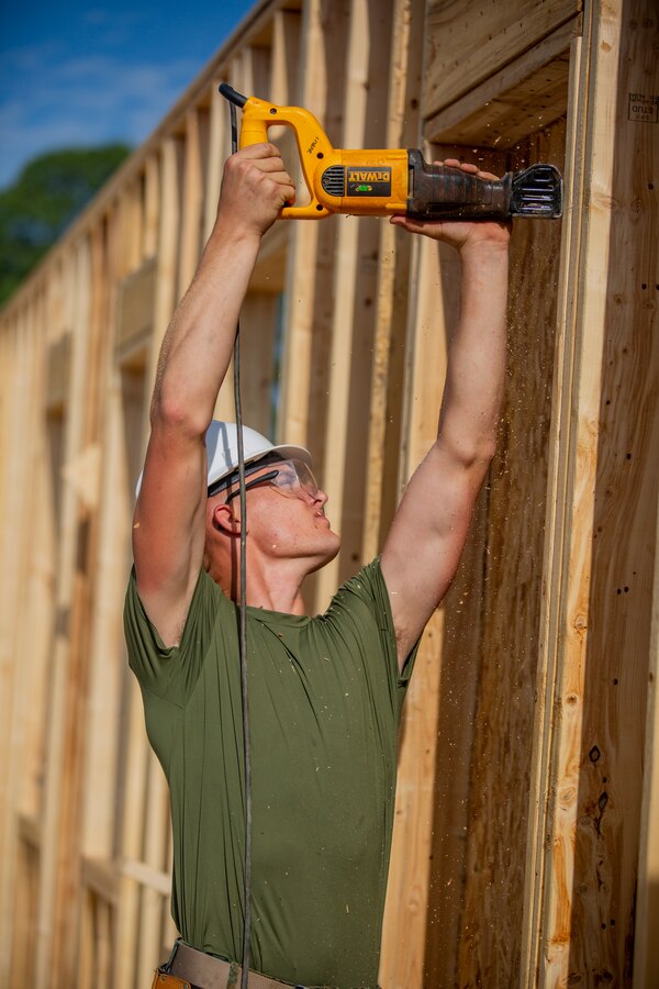 U.S. Marine Corps Lance Cpl. Logan R. Cayce, a combat engineer with Company C, 6th Engineer Support Battalion, 4th Marine Logistics Group, operates a jigsaw during the Innovative Readiness Training Camp Kamassa near Crystal Springs, Miss., on April 24, 2019. The purpose of the Department of Defense’s IRT program is to support the community by pairing military members with civil projects that benefit the community, and enables Marine Reserve units to increase their efficiency and performance. (U.S. Marine Corps photo by Lance Cpl. Jose Gonzalez)