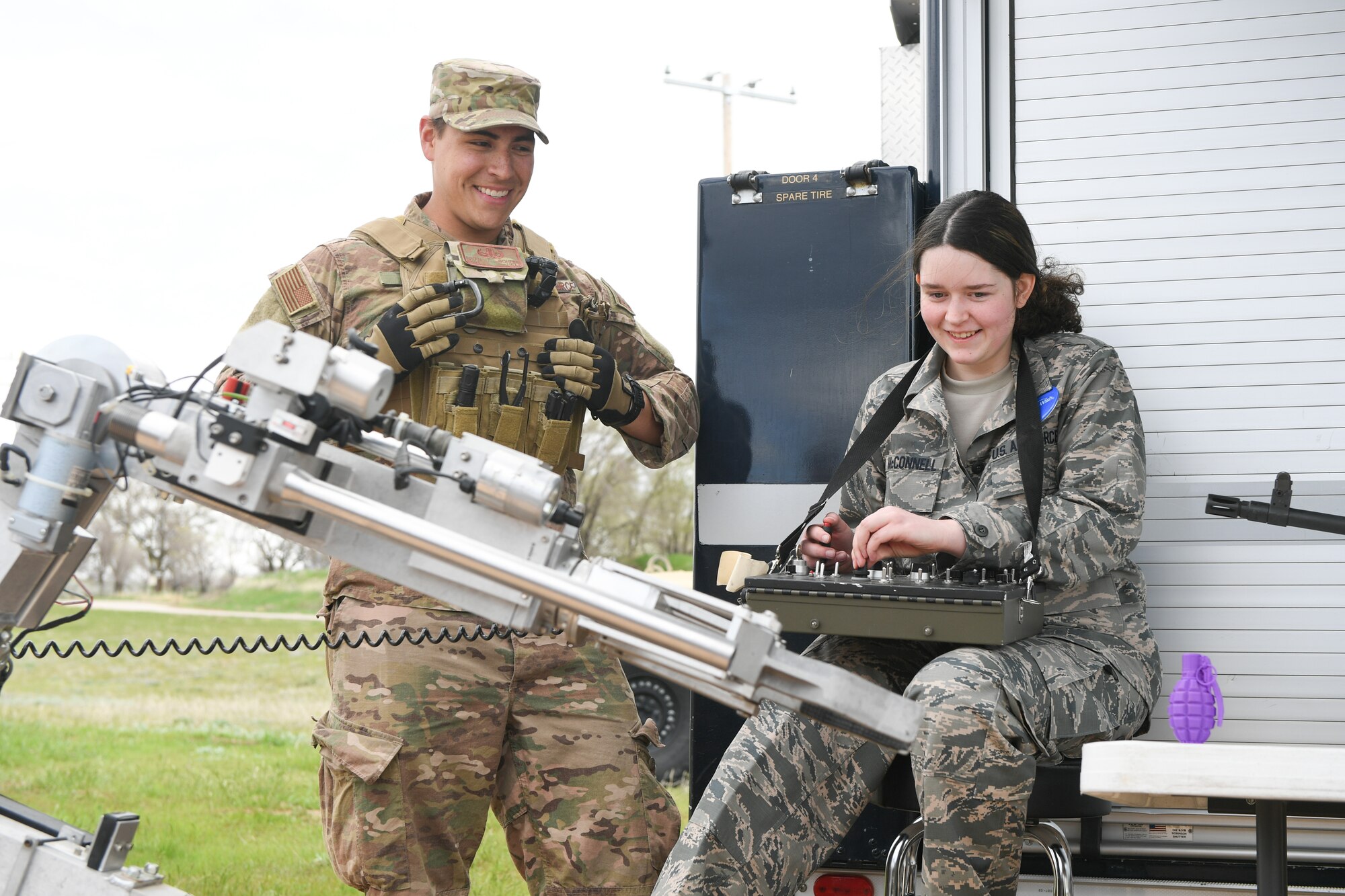 Michelle McConnell operates a Explosion Ordnance Disposal robot with Staff Sgt. Brian Gohlke, 775th Explosive Ordinance Disposal Flight April 22, 2019 at Hill Air Force Base, Utah. Michelle was granted her wish to be Airman of the day by Make-A-Wish Utah and 75th Air Base Wing at Hill. (U.S. Air Force Photo by Cynthia Griggs)